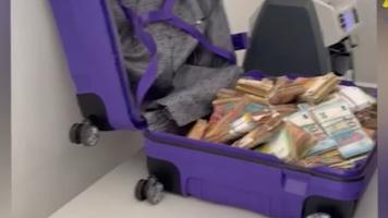 Bărbatul prins cu jumătate de milion de euro într-o valiză – condamnat la închisoare