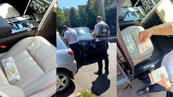 Avocat cu „Land Rover Discovery”, reținut de CNA pentru o mită de 50 000 de euro