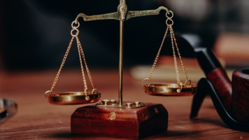 O altă persoană acuzată de complicitate la finanțarea ilegală a PP „ALDE”, trimisă în judecată