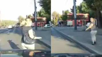 (VIDEO) O femeie, la un pas să fie luată pe sus de o mașină