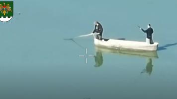 (VIDEO) Pescari cu „undiță în afara legii”, „pescuiți” cu drona de IGPF pe râul Prut, la Cahul