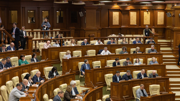 Parlamentul a adoptat legea care redistribuie competențele CNA, PA și PCCOCS