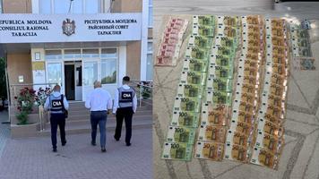Percheziții CNA, la Taraclia. Președintele raionului și alți doi funcționari, suspectați de trucare a licitațiilor și abuz de serviciu